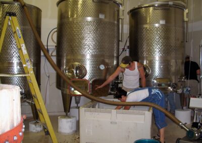 people working in a brewery